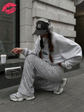 HIGH WAIST SHINY TROUSERS