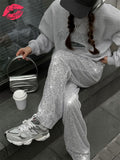 HIGH WAIST SHINY TROUSERS
