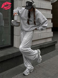 HIGH WAIST SHINY TROUSERS